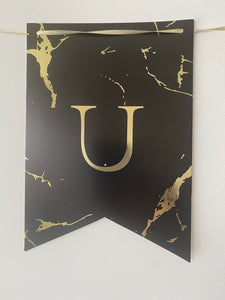 Black and gold foil banner