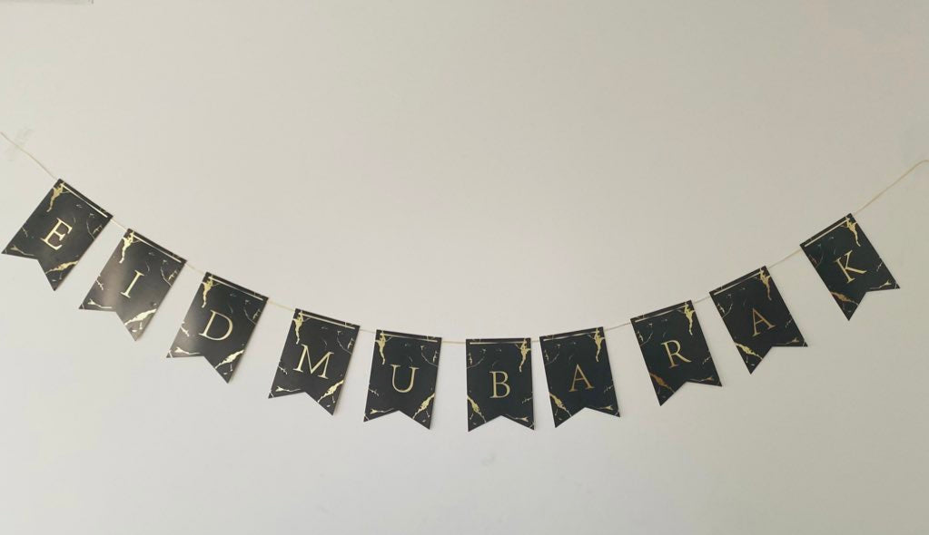 Black and gold foil banner